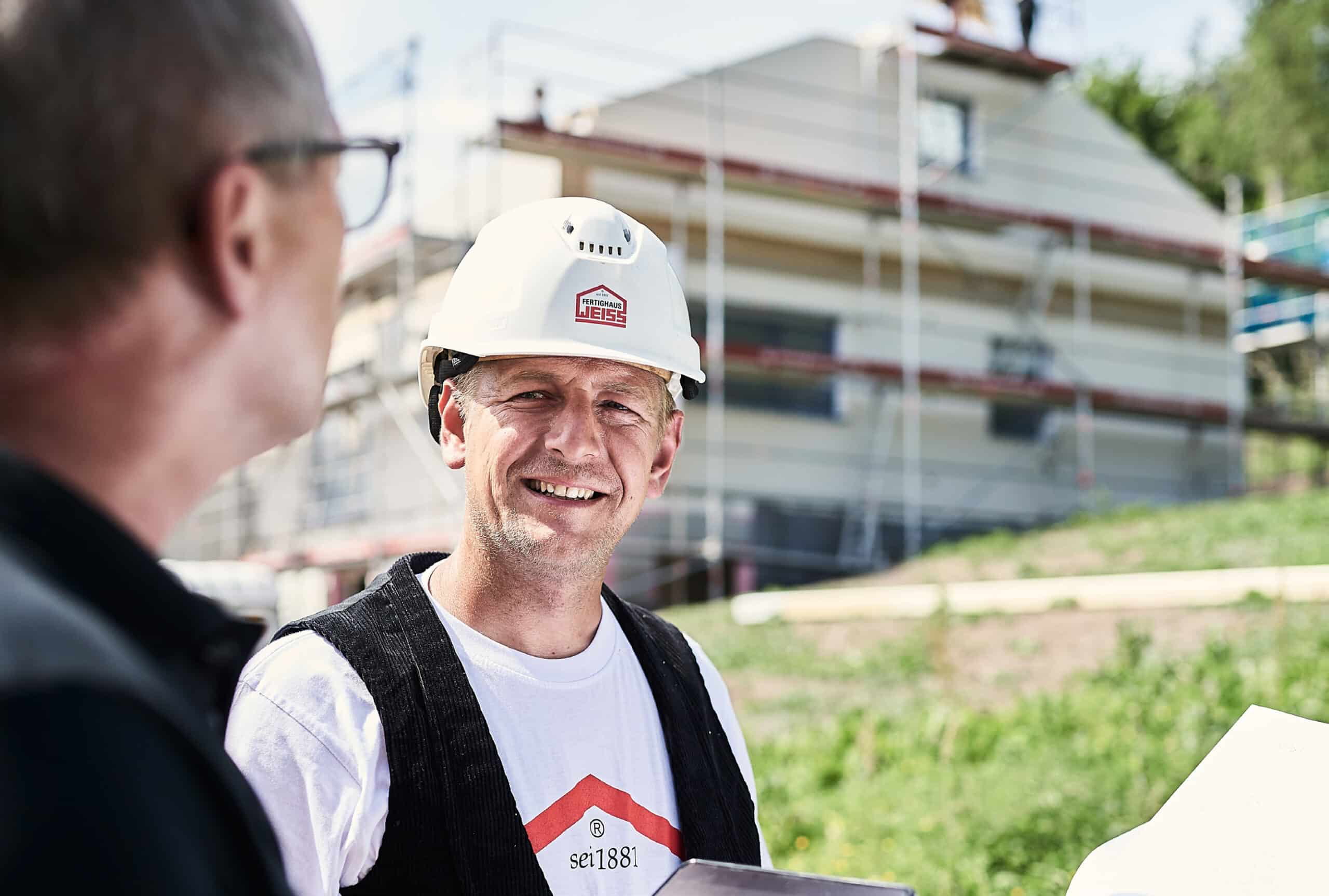 Baustellenbesprechung bei Fertighaus WEISS