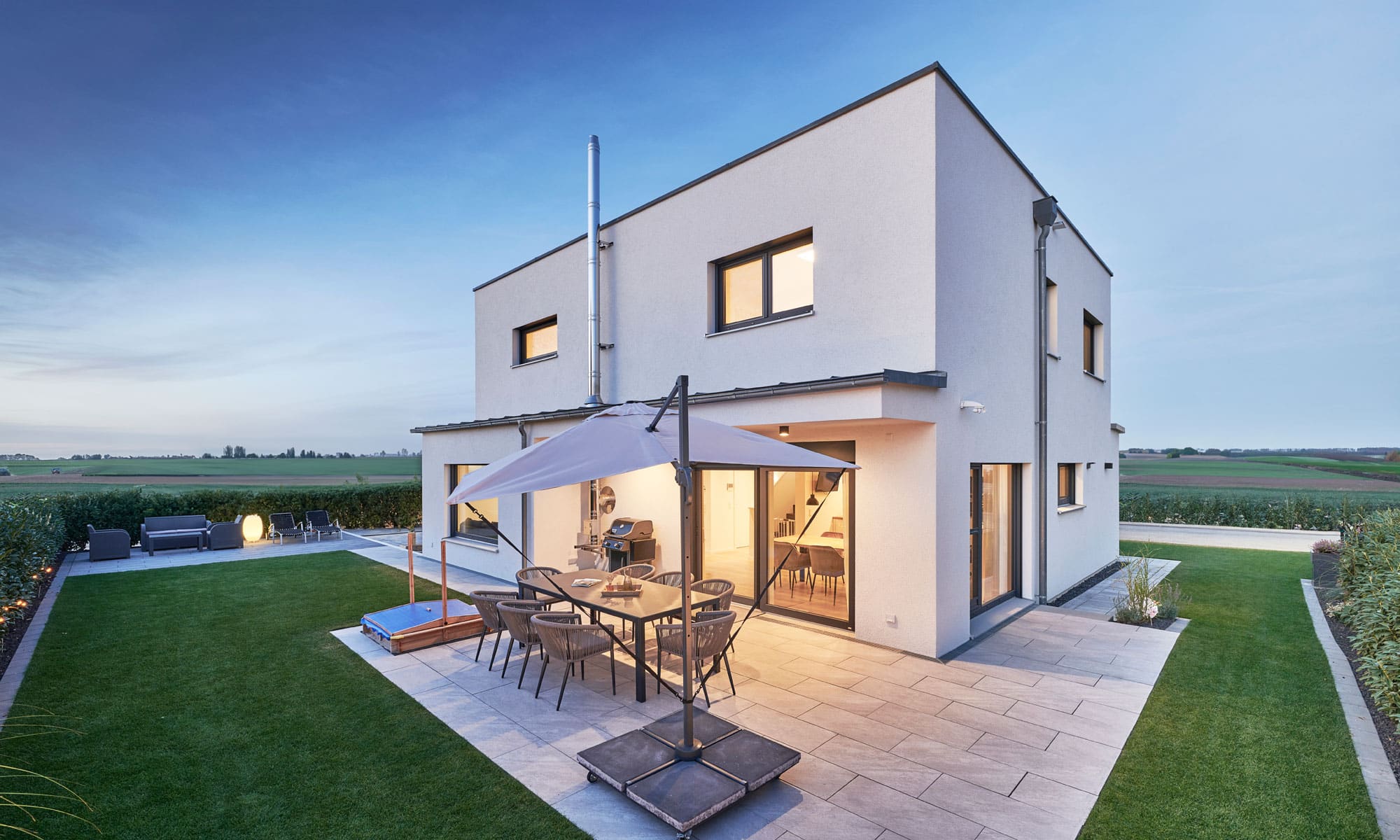 Garten von Haus Schaffitzel von Fertighaus WEISS